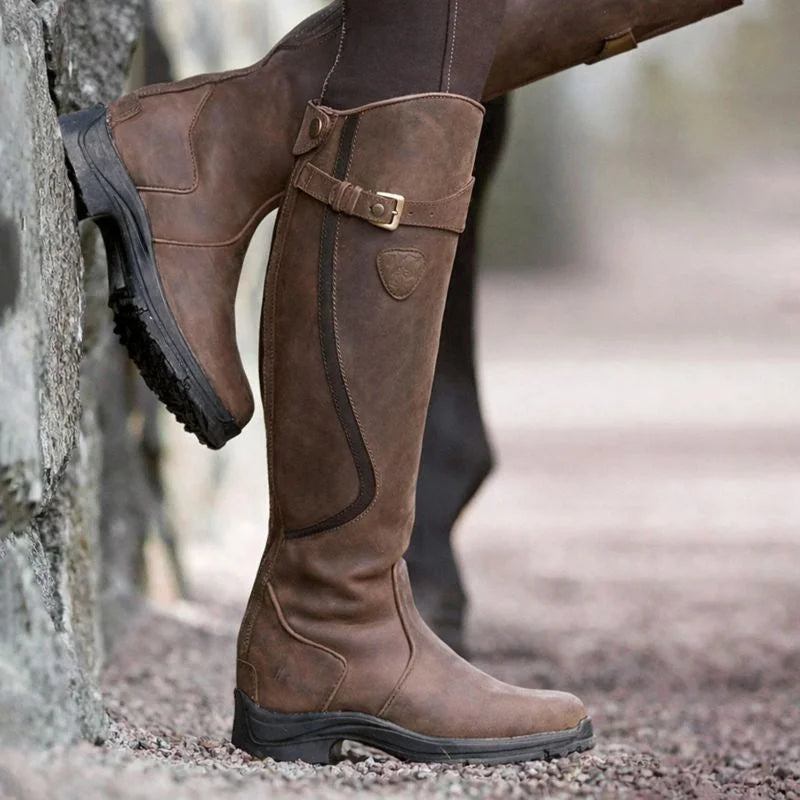 Women's waterproof brown riding boots with side zipper and buckle strap