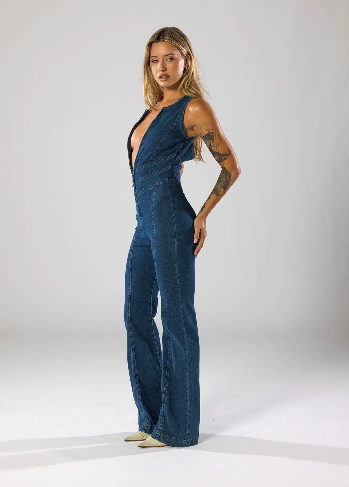 Vintage-Inspired Denim Jumpsuit with Deep V-Neck