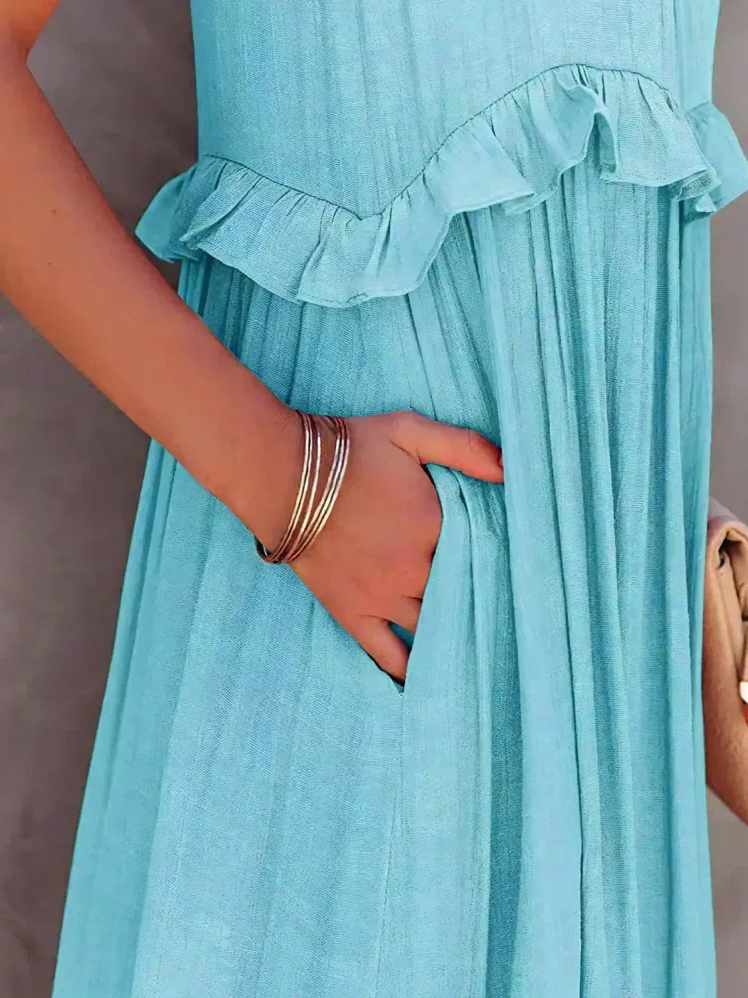 Women's Sleeveless Dress with Ruffles and Flowy Design
