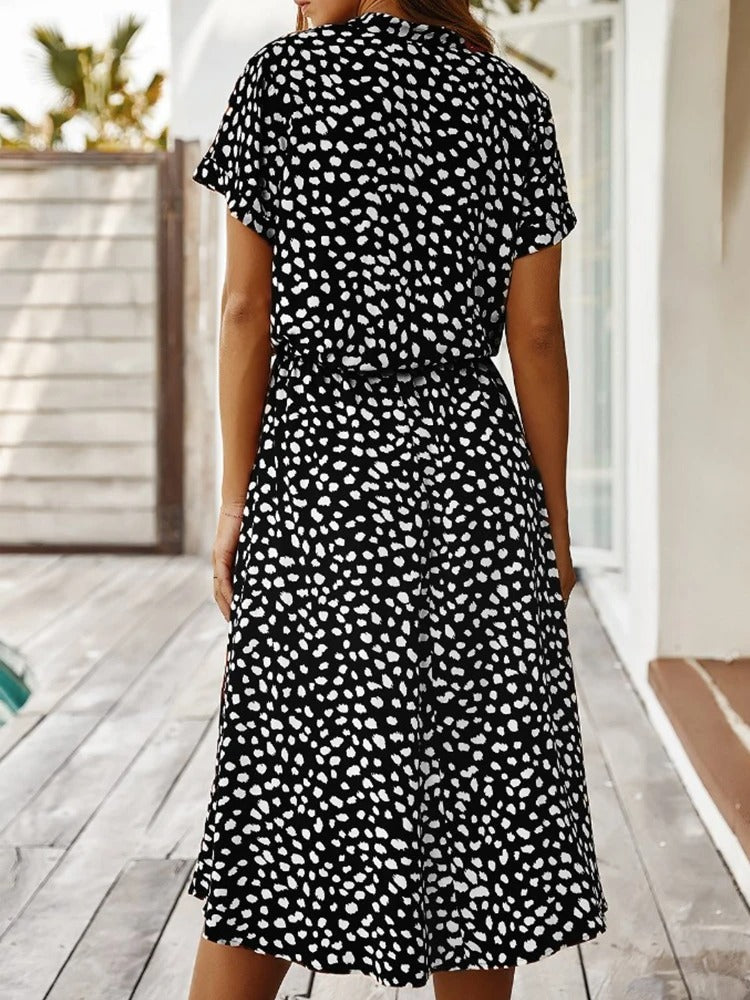 Women's Summer Dress with Adjustable Straps and Flowing Skirt